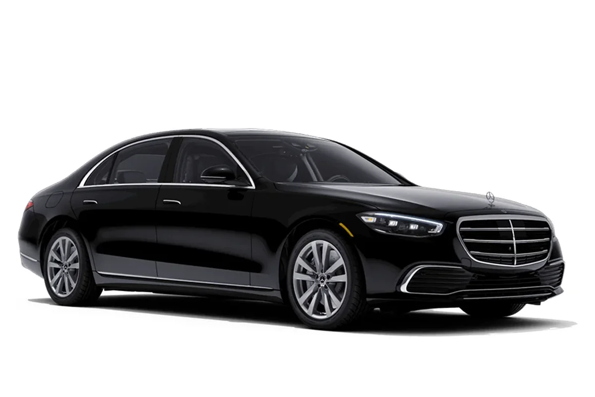 black Mercedes-Benz sedan on a white studio background